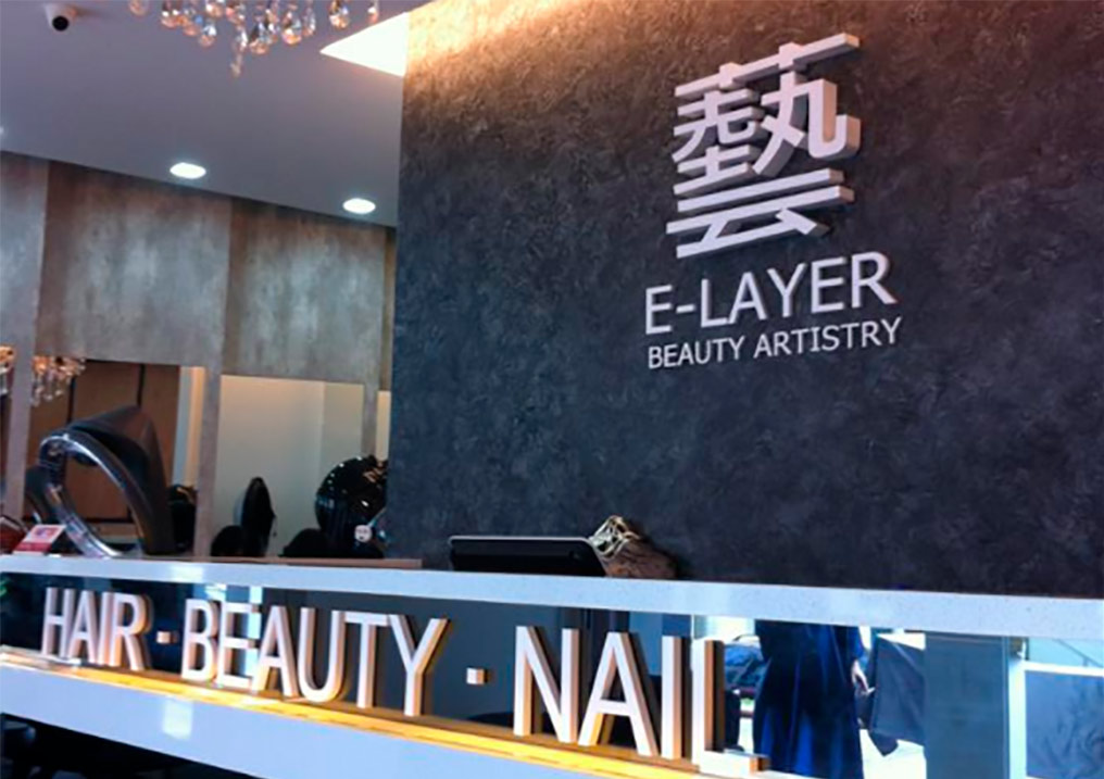 E. Layer Unisex Hair & Beauty Salon